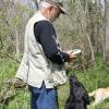 Bill and Linc consult the wildflower book